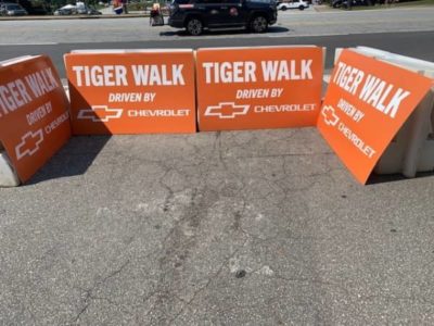 signage reading tiger walk driven by Chevrolet